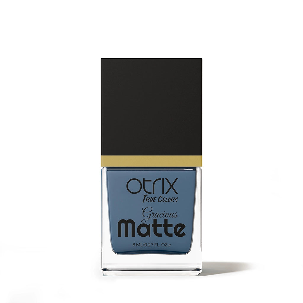 Midnight Indigo blue nail polish bottle on a clean white background showcasing rich matte color